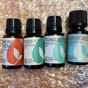 Rocky Mountain Oils set of 4 new sealed like Doterra and Young Living